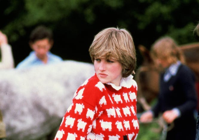 british royal family casuals equestrian events half lengths half-lengths hands in pockets jeans jumpers looking right off duty pensive polo princess diana red jumper royals royalty wool woolen clothing coat knitwear sweater boy child male person face long sleeve