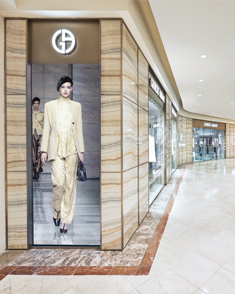 floor indoors interior design coat adult male man person shopping mall flooring