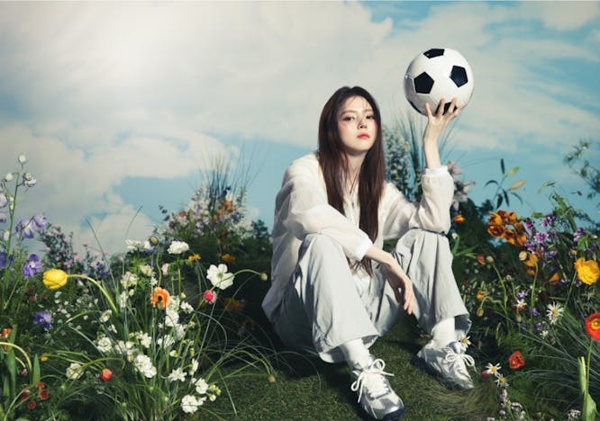 soccer ball person sitting female girl teen sphere daisy flower shoe