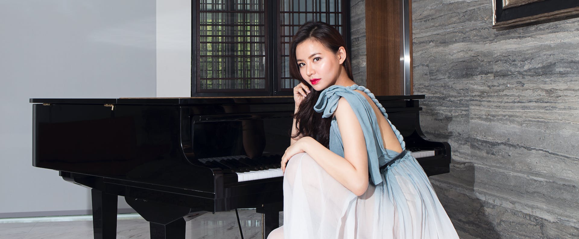 piano musical instrument leisure activities person grand piano evening dress fashion gown clothing performer