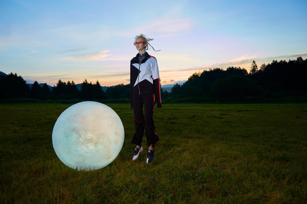 sphere person human grass plant clothing apparel ball