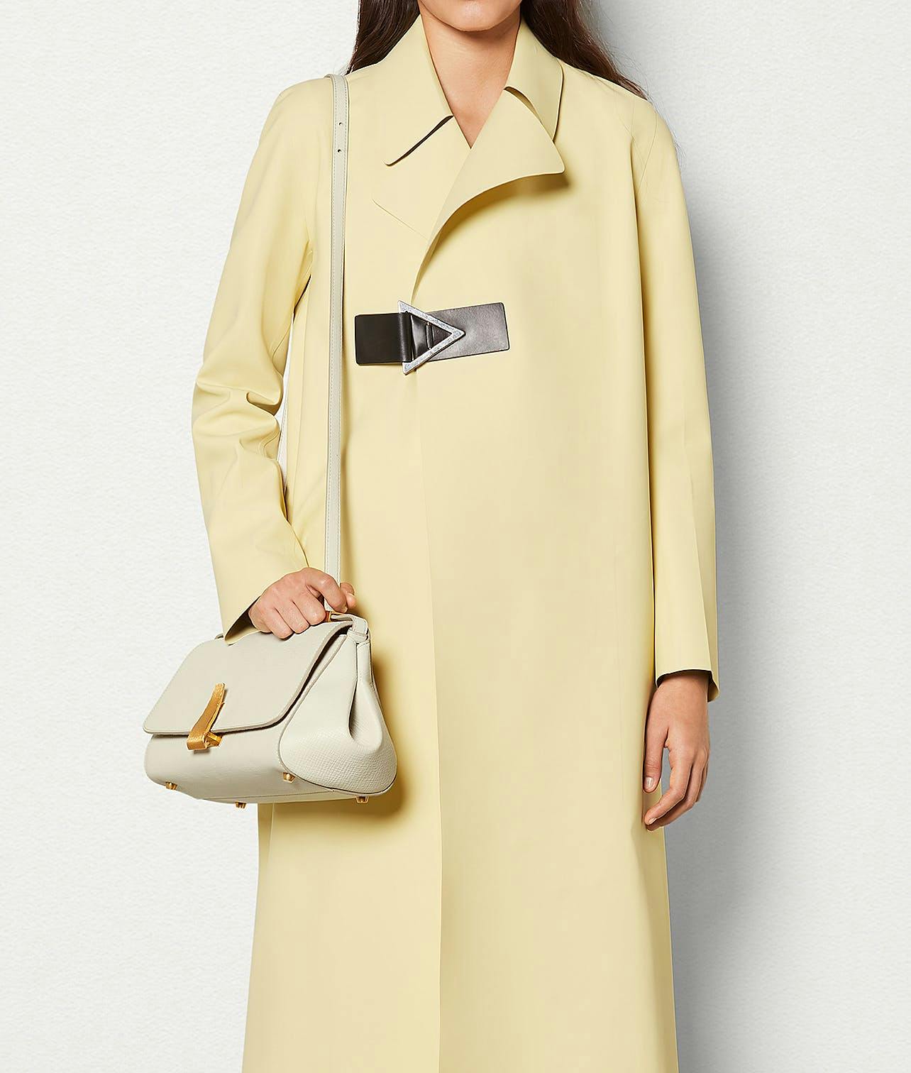 clothing apparel overcoat coat sleeve trench coat shirt long sleeve