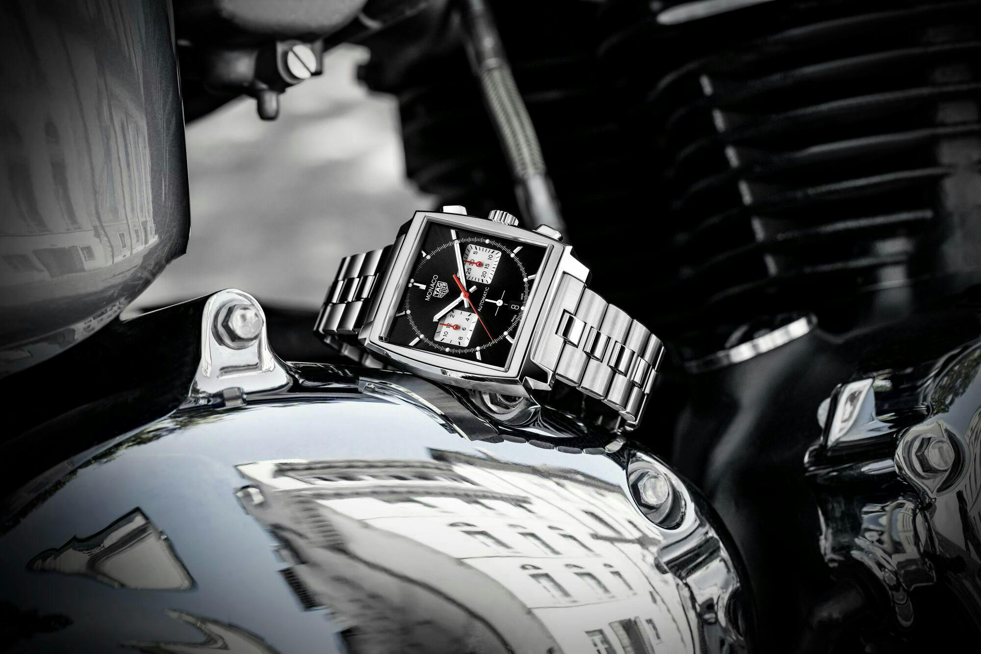 motorcycle transportation vehicle logo symbol trademark wristwatch machine