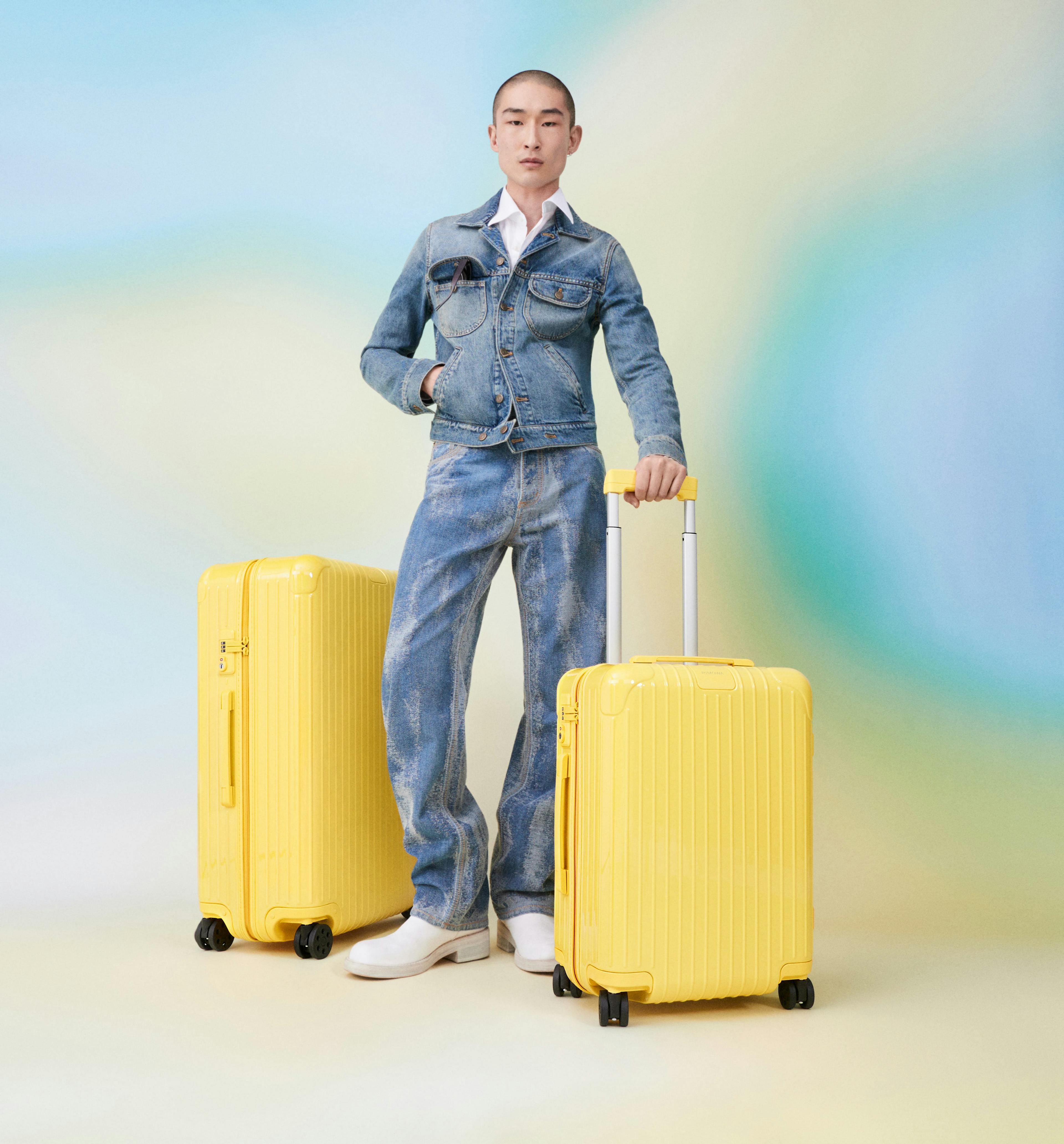 pants clothing apparel luggage person human jeans denim