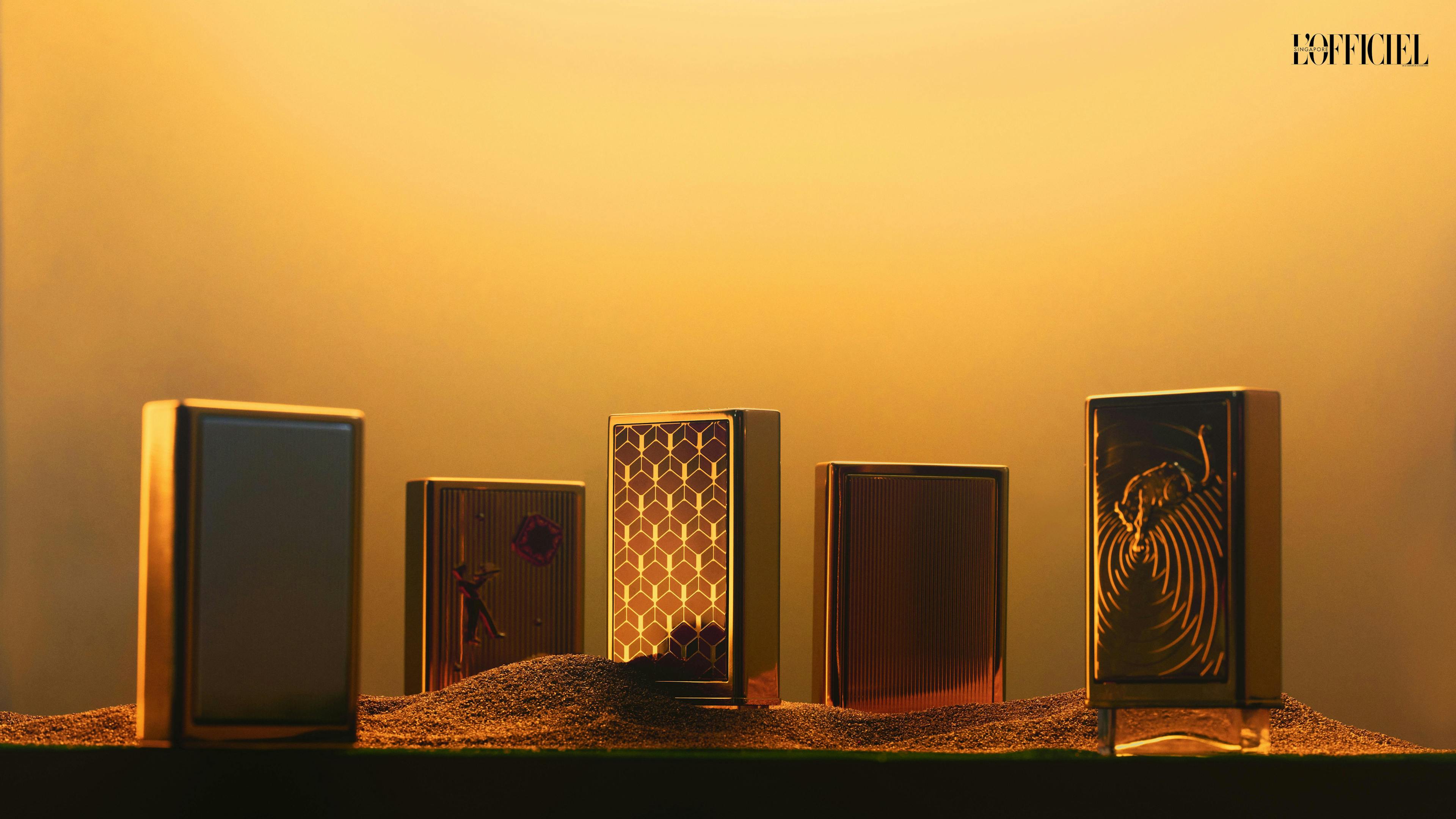 CARTIER NÉCESSAIRES À PARFUM SILVERY CASE, $690, DIABOLO CASE, $1,480, RED DOT CASE, $1,200, GOLDENCASE,$690,AND LAPANTHÈRECASEWITHLA PANTHÈRE FRAGRANCE, $830. Since its launch a year ago, the Cartier Nécessaires à Parfum Collection remains one of the Maison’s finest objects of desire. Now, the house has introduced a new design to its range of vanity cases — a red lacquered style elevated with a geometric motif that pays homage to Cartier’s famous red case.