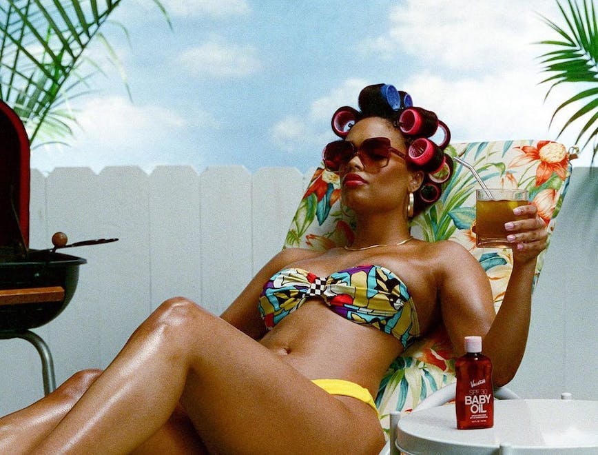 summer adult female person woman sunbathing furniture beer beverage sunglasses