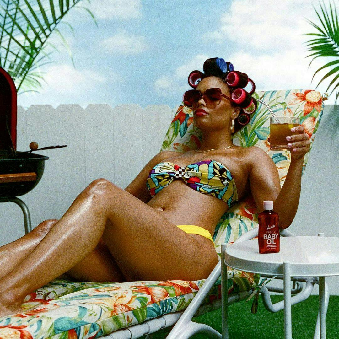 summer adult female person woman sunbathing furniture beer beverage sunglasses
