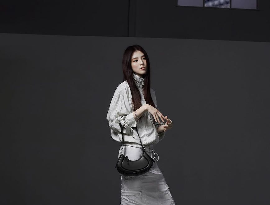 adult female person woman clothing dress bag handbag fashion formal wear