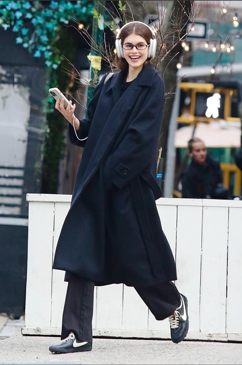 clothing coat lady person pedestrian overcoat face head